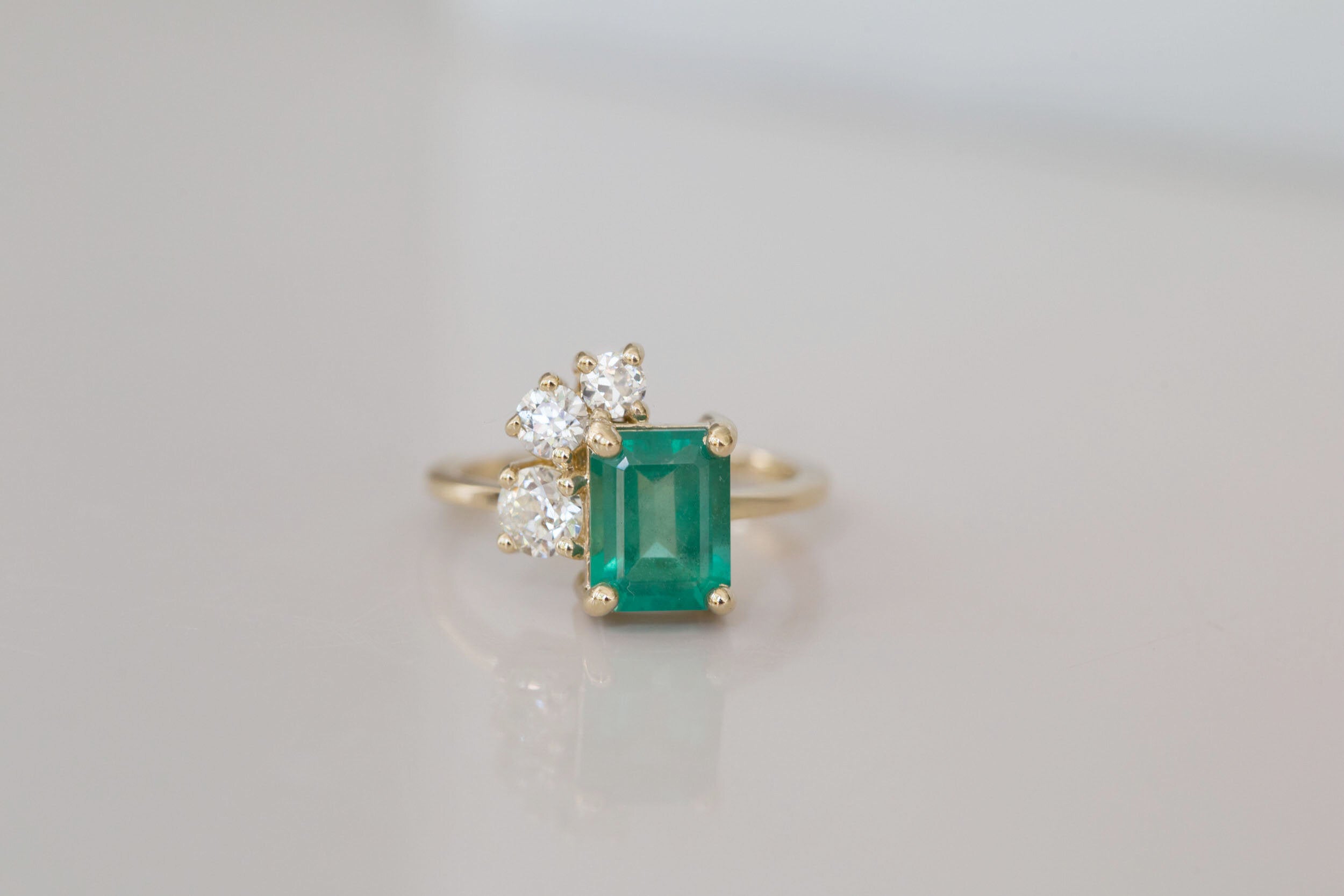 Adra Ring | Emerald + Old European Cut Diamond Cluster Engagement Ring | 14k Recycled Gold | One of a Kind