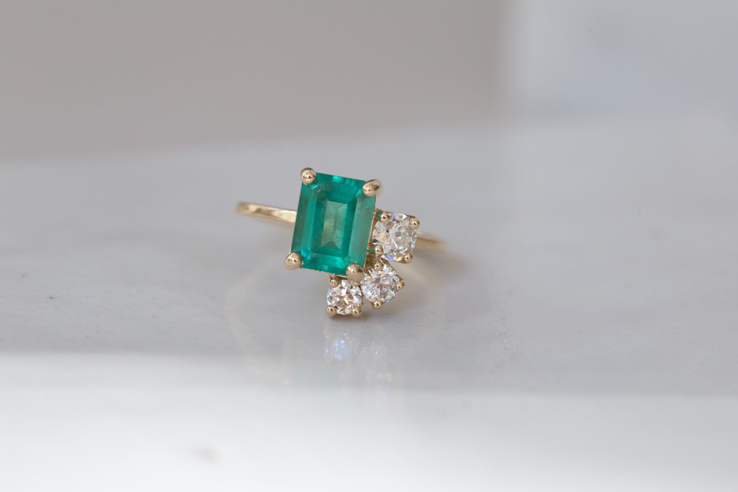 Adra Ring | Emerald + Old European Cut Diamond Cluster Engagement Ring | 14k Recycled Gold | One of a Kind