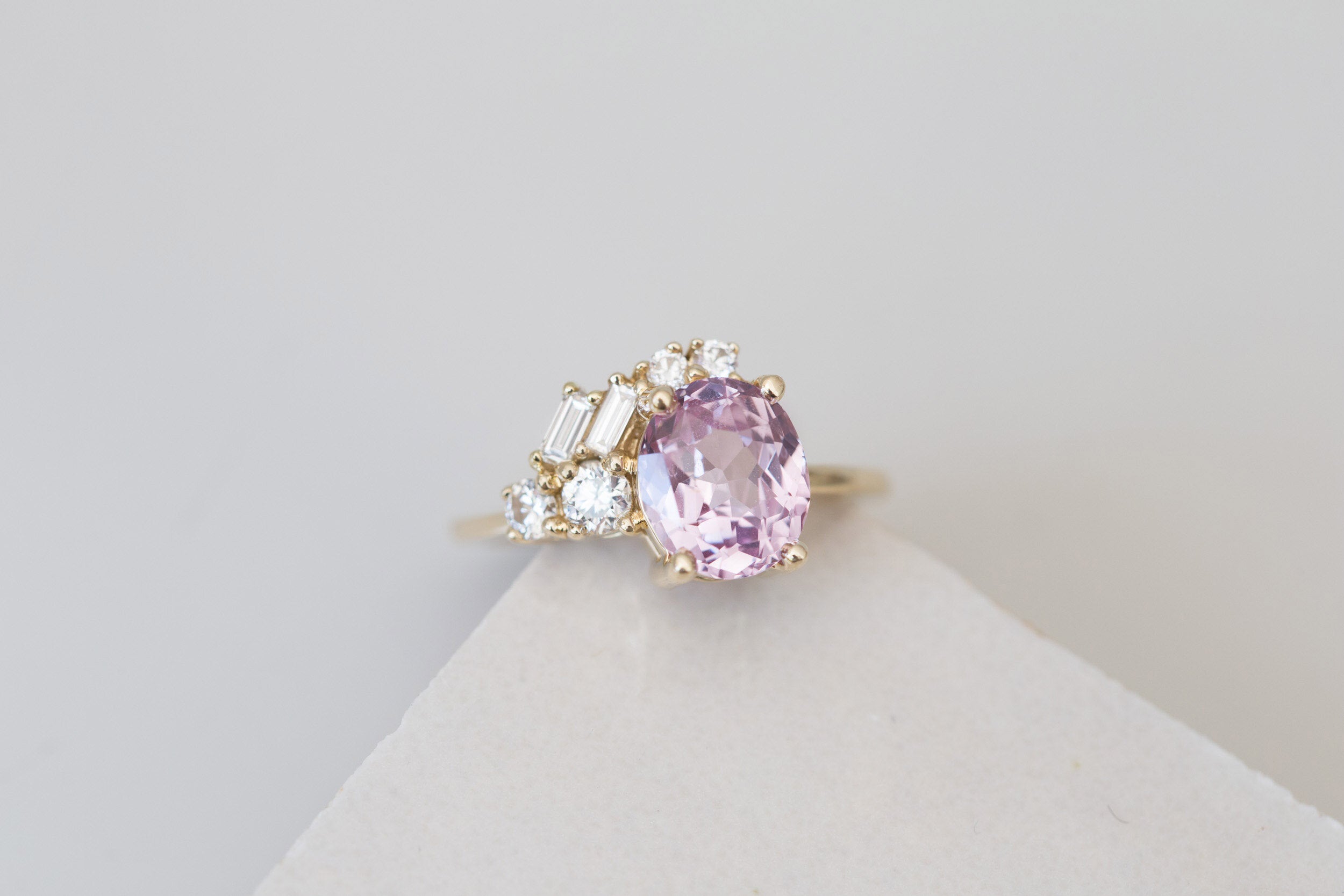 Iolanthe Ring | Pale Magenta Oval Sapphire + Diamond Baguette Arch Cluster Engagement Ring | 14k Recycled Gold | One of a Kind