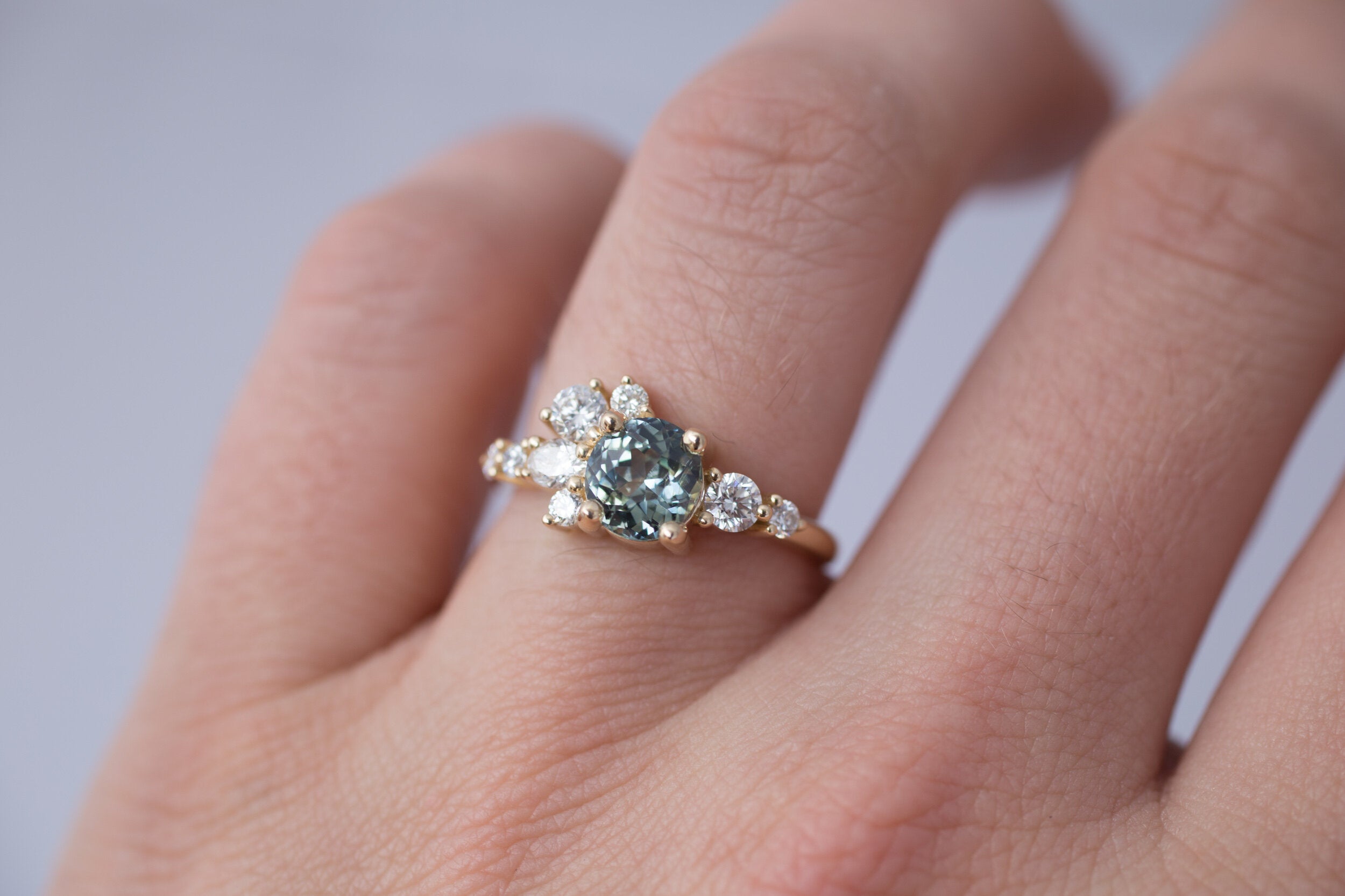 Ilia Ring | Blue Green Round Sapphire + Diamond Cluster Engagement Ring | 14k Recycled Gold | One of a Kind