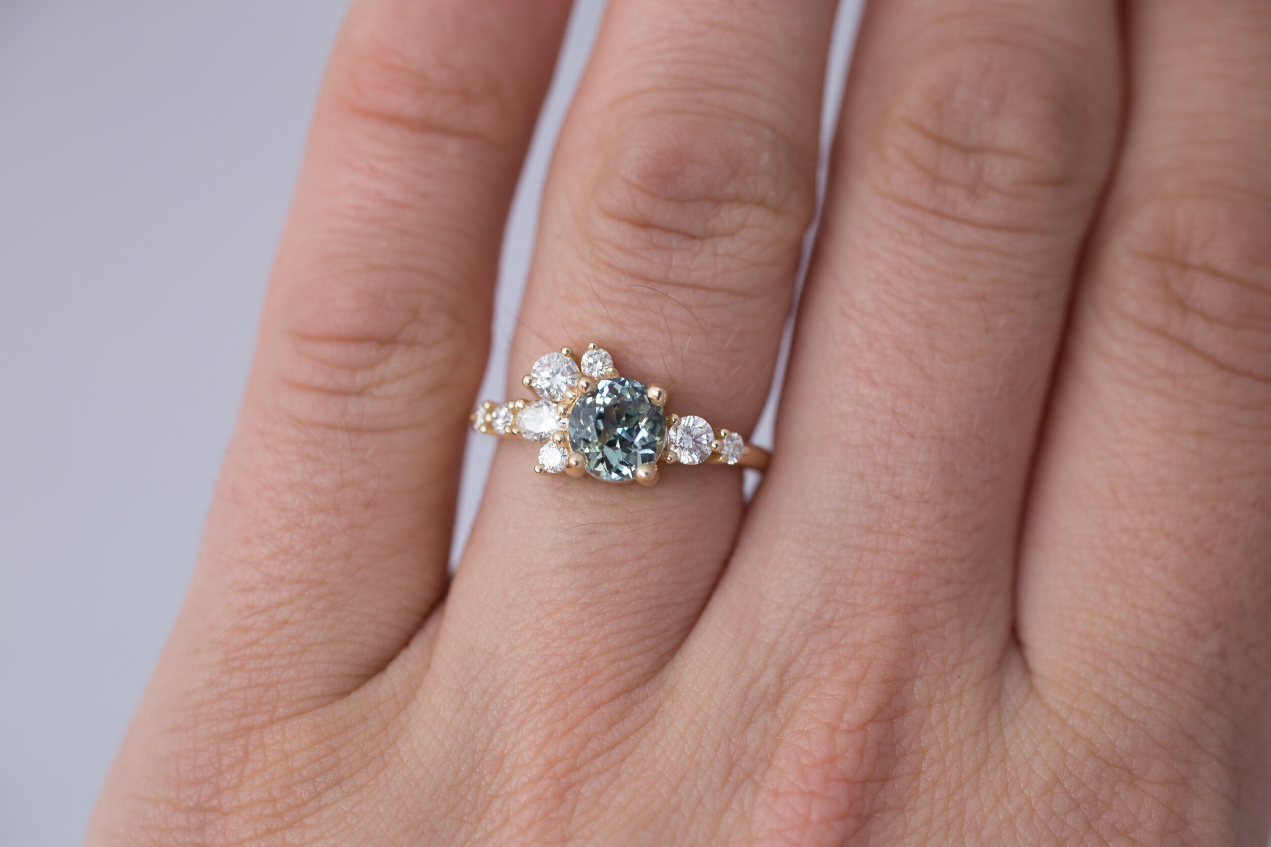 Ilia Ring | Blue Green Round Sapphire + Diamond Cluster Engagement Ring | 14k Recycled Gold | One of a Kind