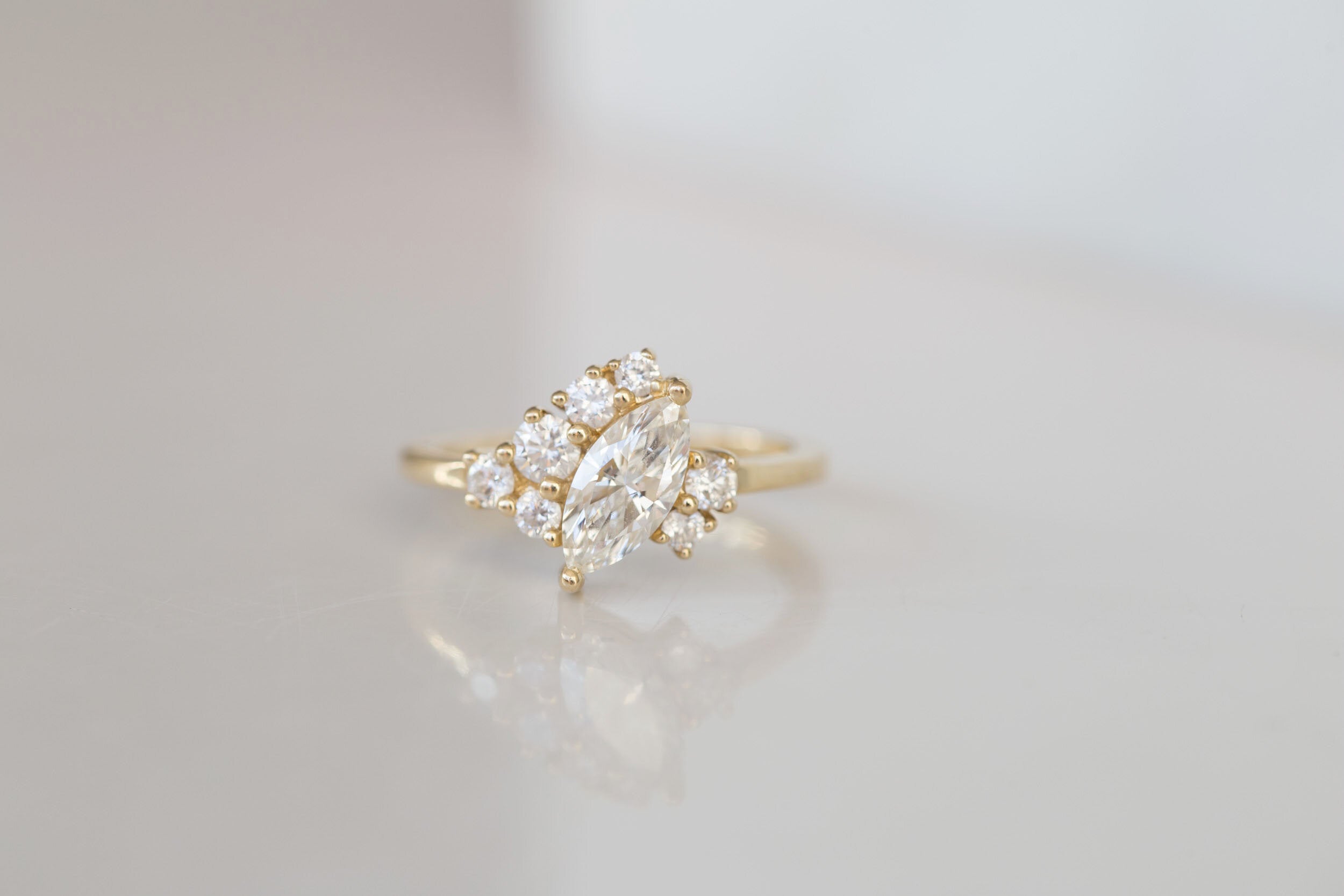 Aletris Ring | Offset Marquise Diamond + Diamond Cluster Engagement Ring | 14k Recycled Gold | One of a Kind