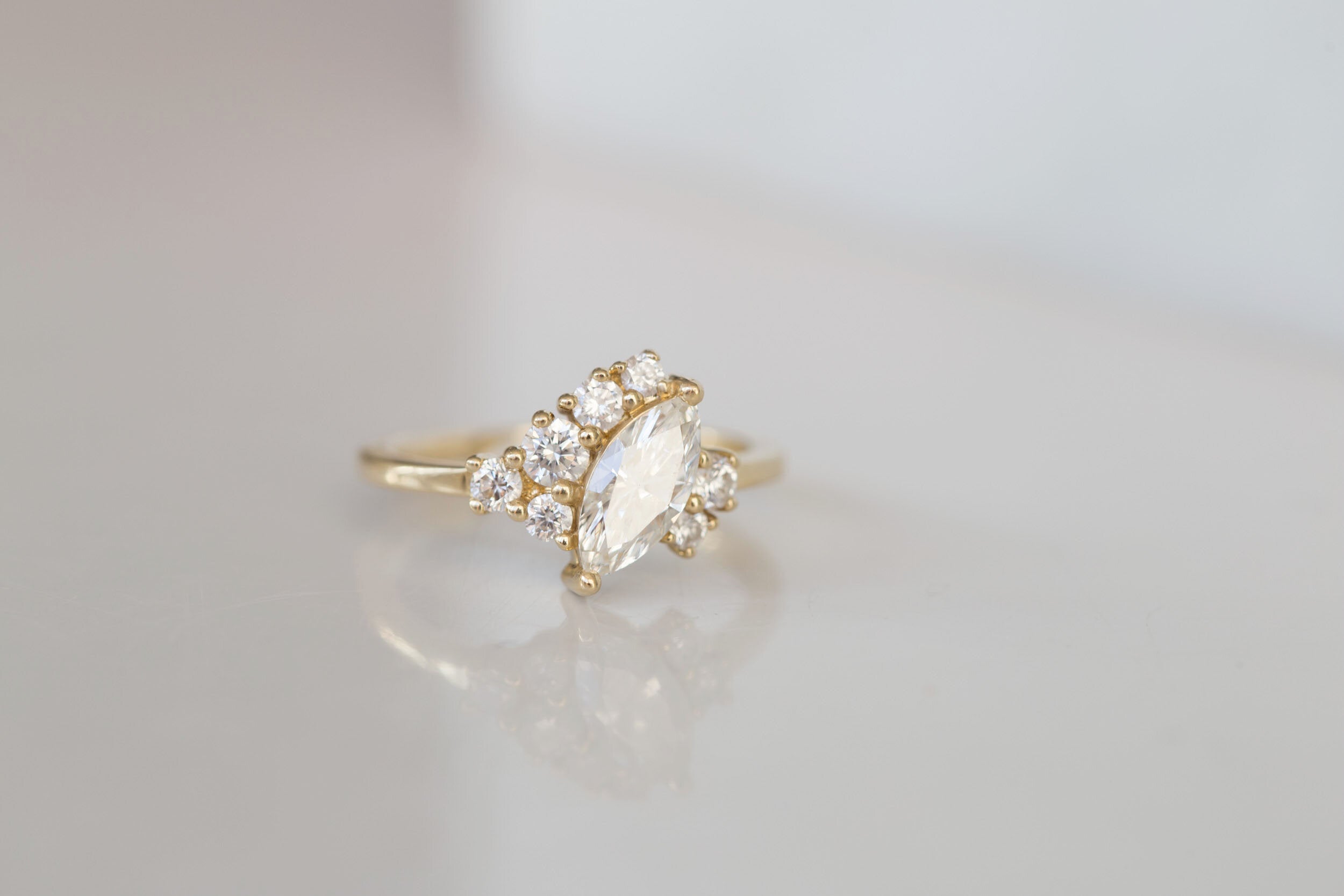 Aletris Ring | Offset Marquise Diamond + Diamond Cluster Engagement Ring | 14k Recycled Gold | One of a Kind