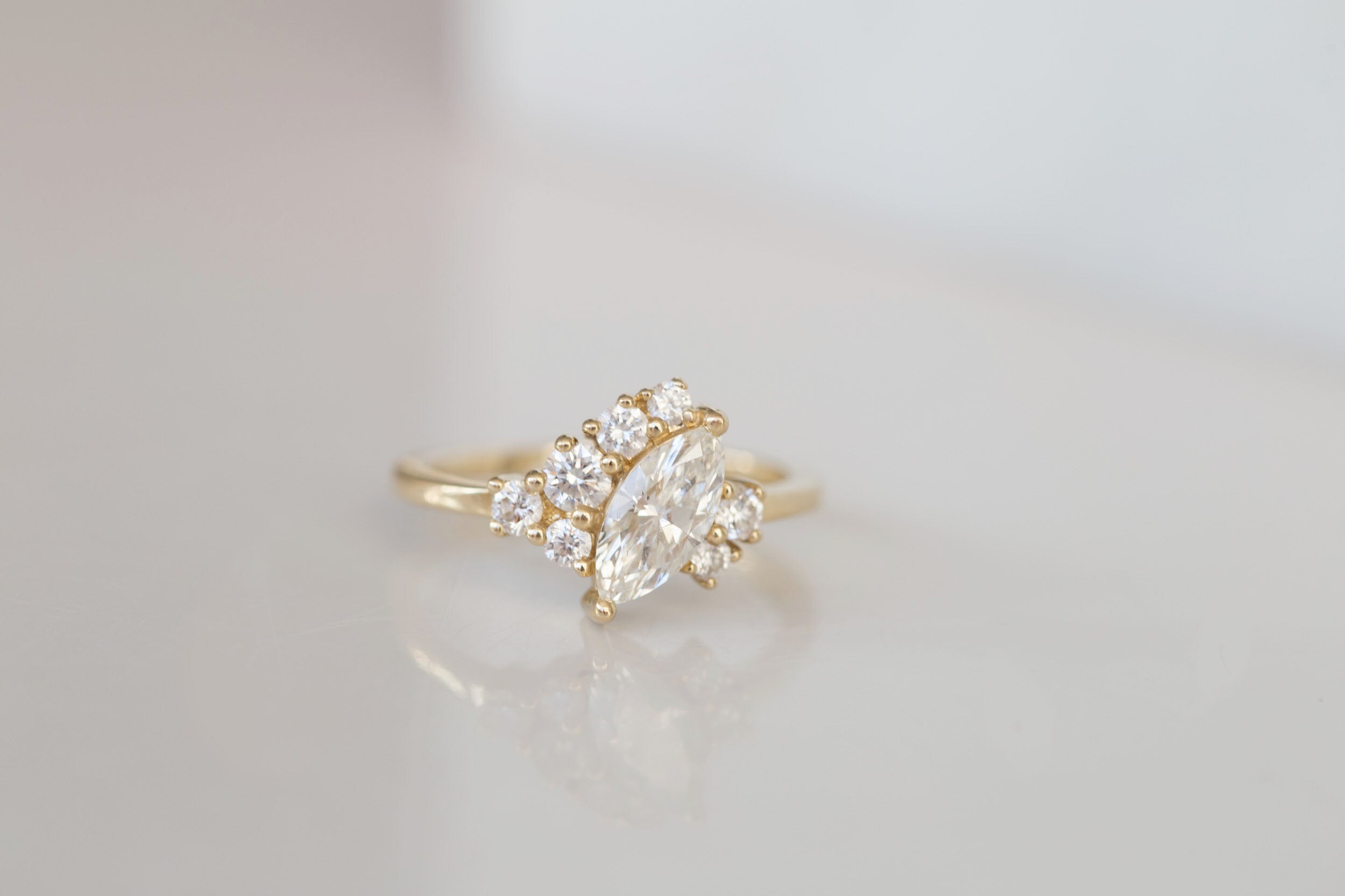 Aletris Ring | Offset Marquise Diamond + Diamond Cluster Engagement Ring | 14k Recycled Gold | One of a Kind