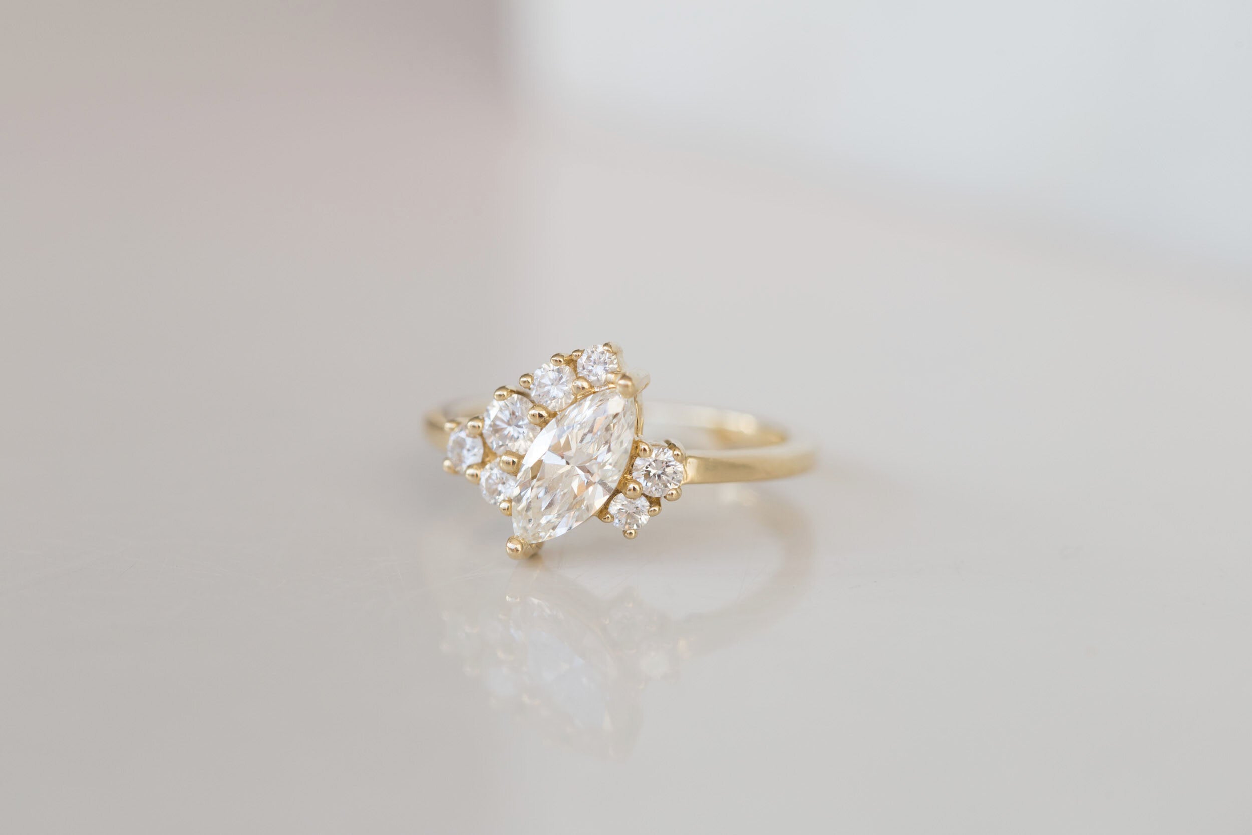 Aletris Ring | Offset Marquise Diamond + Diamond Cluster Engagement Ring | 14k Recycled Gold | One of a Kind