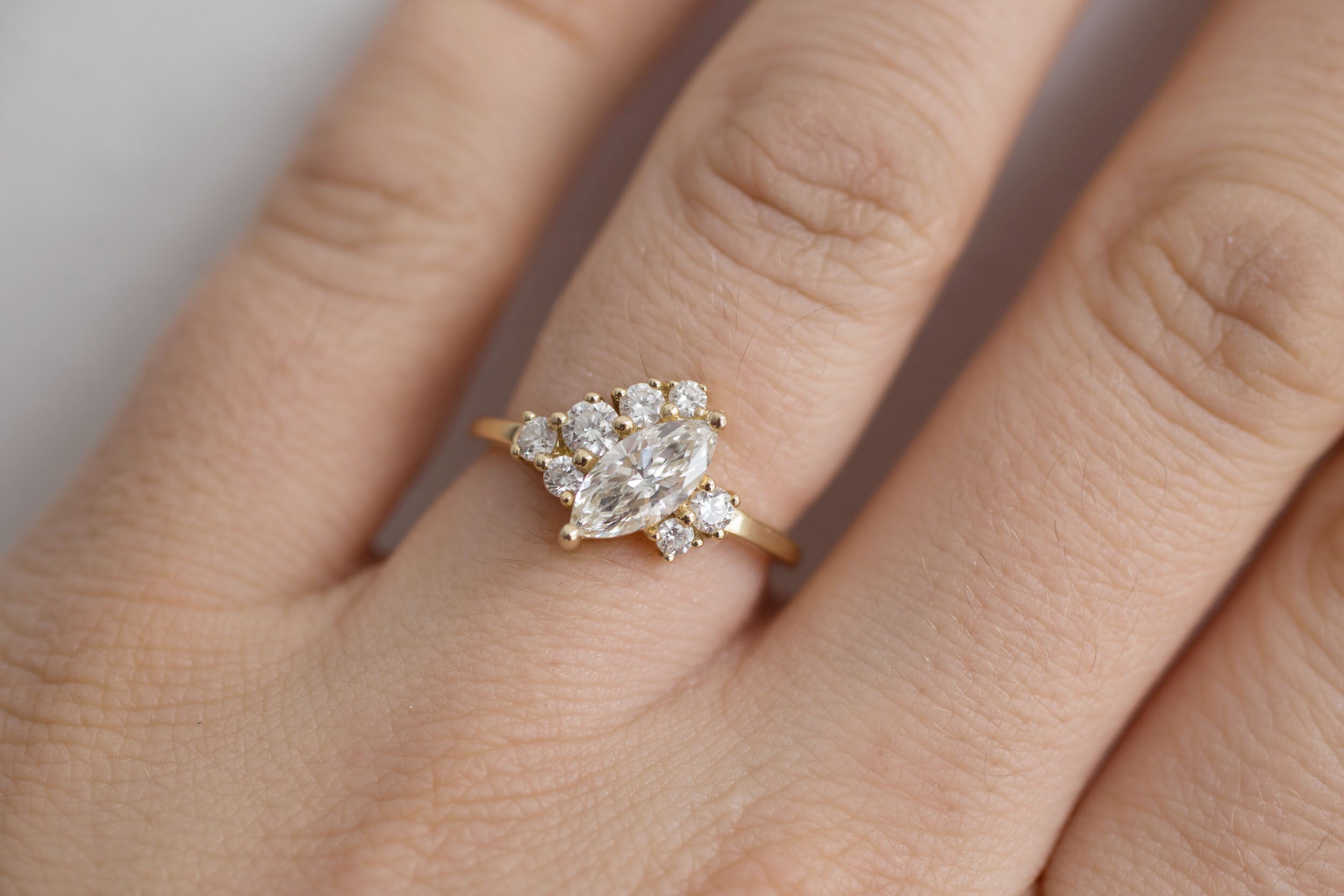 Aletris Ring | Offset Marquise Diamond + Diamond Cluster Engagement Ring | 14k Recycled Gold | One of a Kind