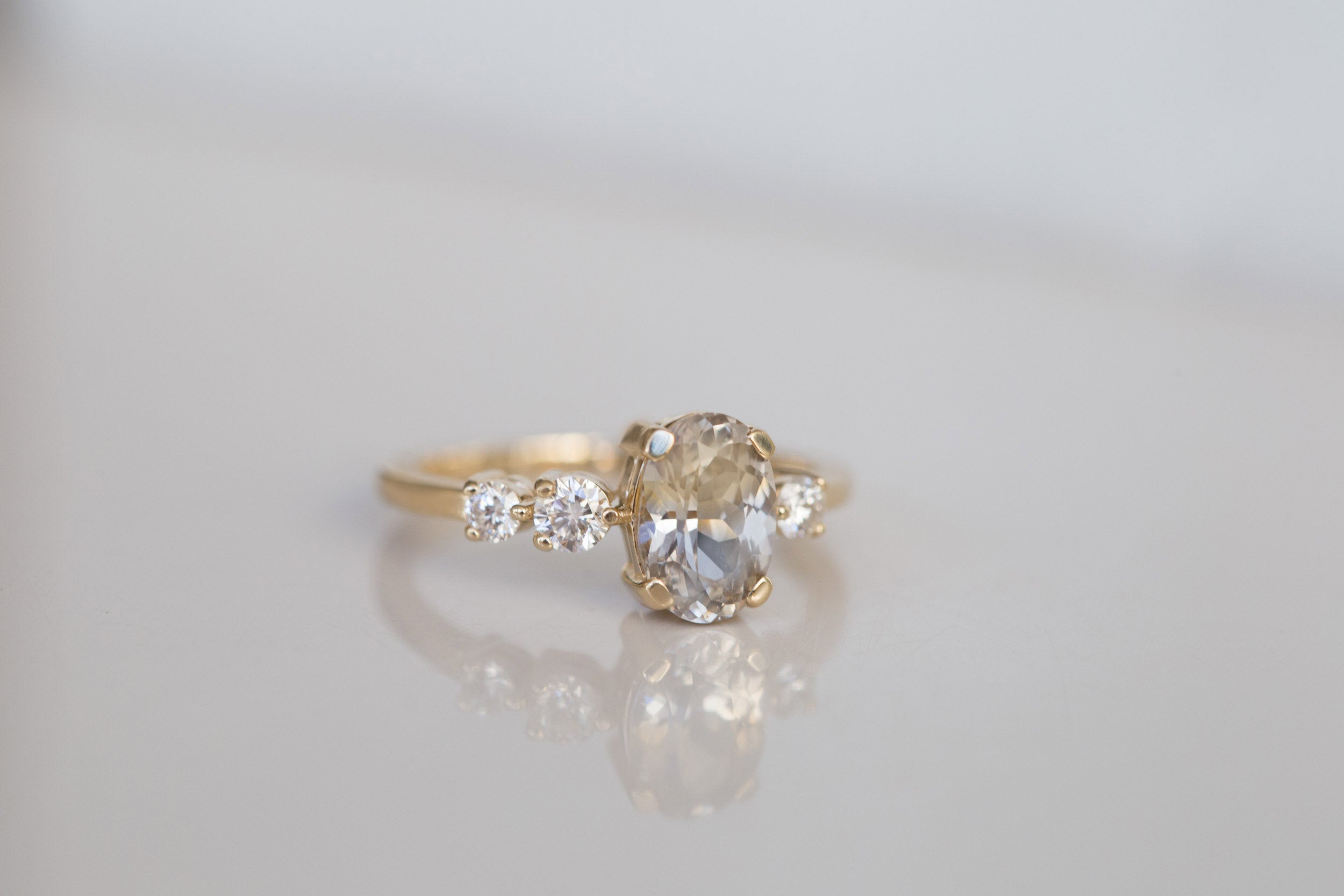 Cassia Ring | Bicolor Oval Sapphire + Diamond Asymmetrical Engagement Ring | 14k Recycled Gold | One of a Kind