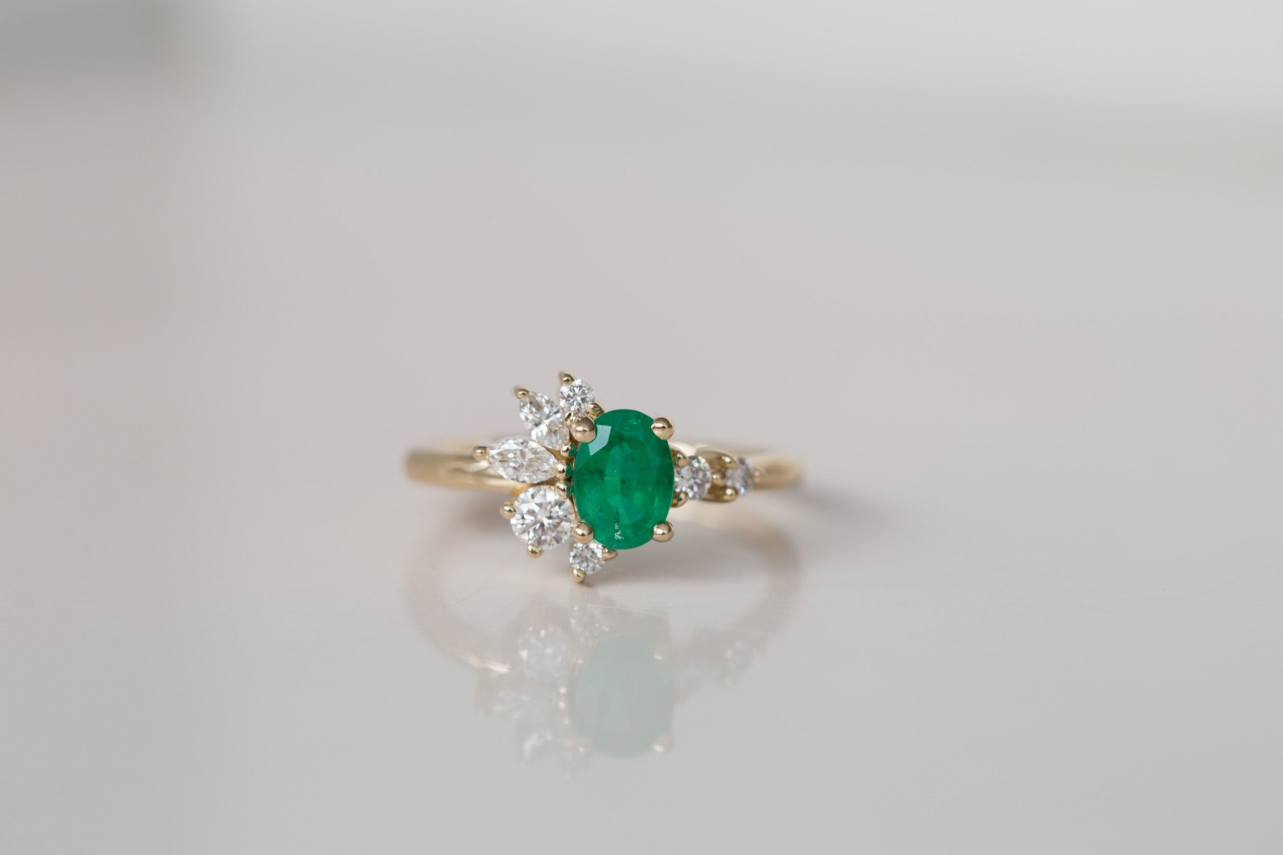 Ambretta Ring | Oval Emerald + Diamond Cluster Engagement Ring | 14k Recycled Gold