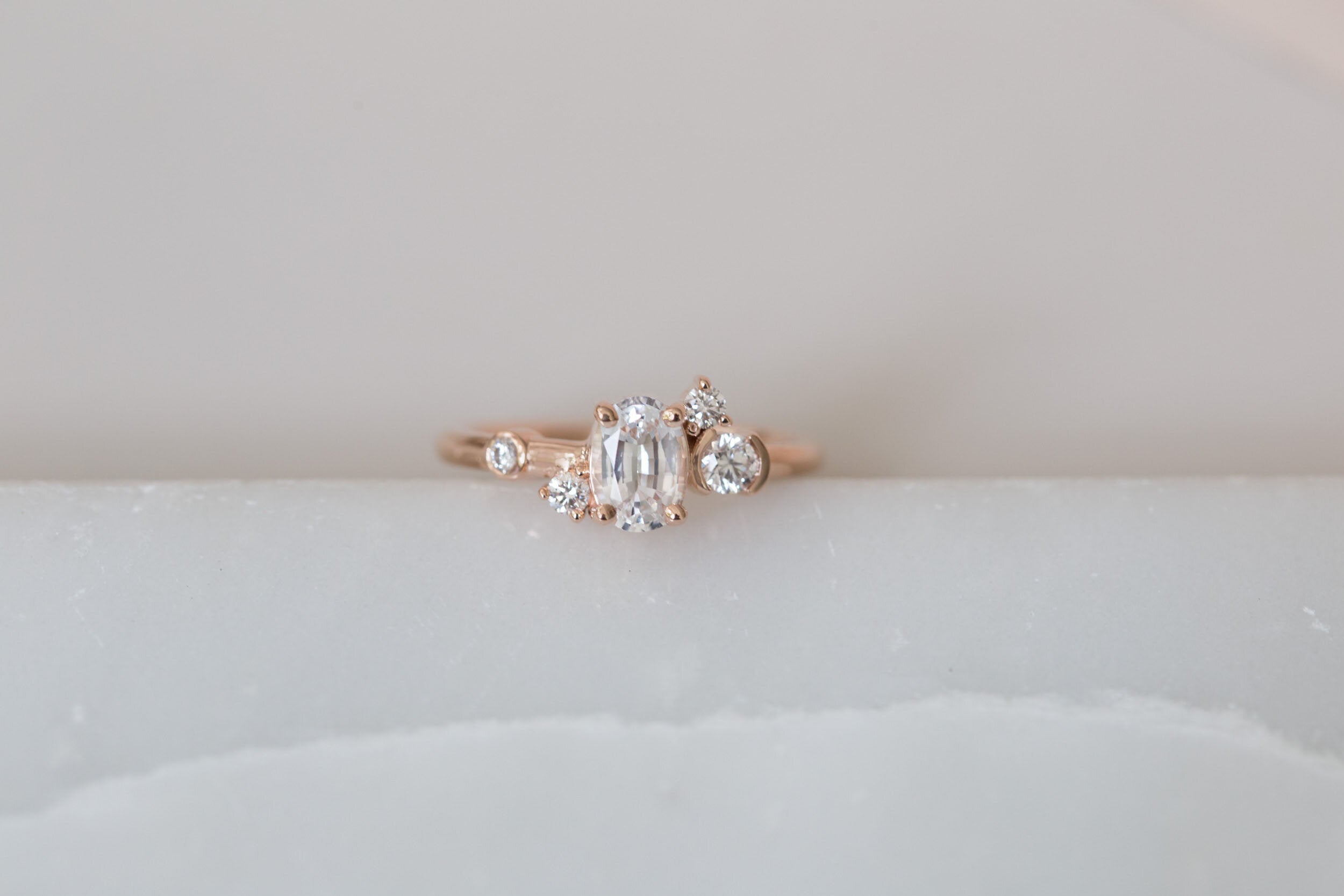 Mae Ring | Oval White Sapphire + Diamond Cluster Engagement Ring | 14k Recycled Rose Gold