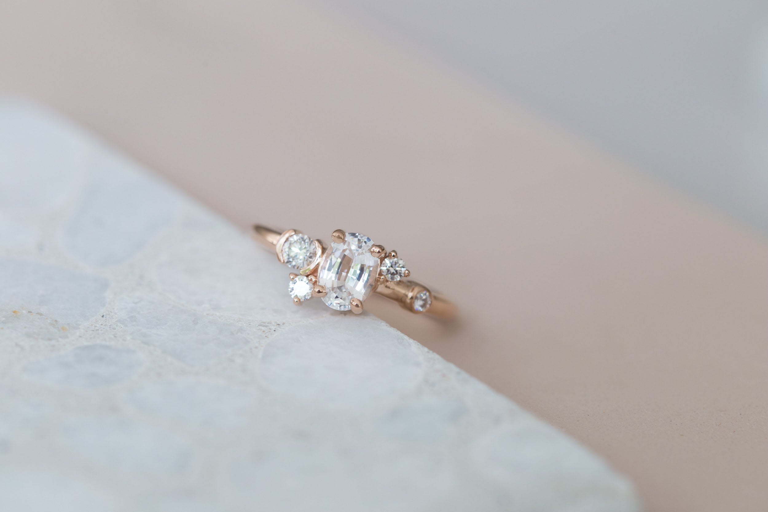 Mae Ring | Oval White Sapphire + Diamond Cluster Engagement Ring | 14k Recycled Rose Gold