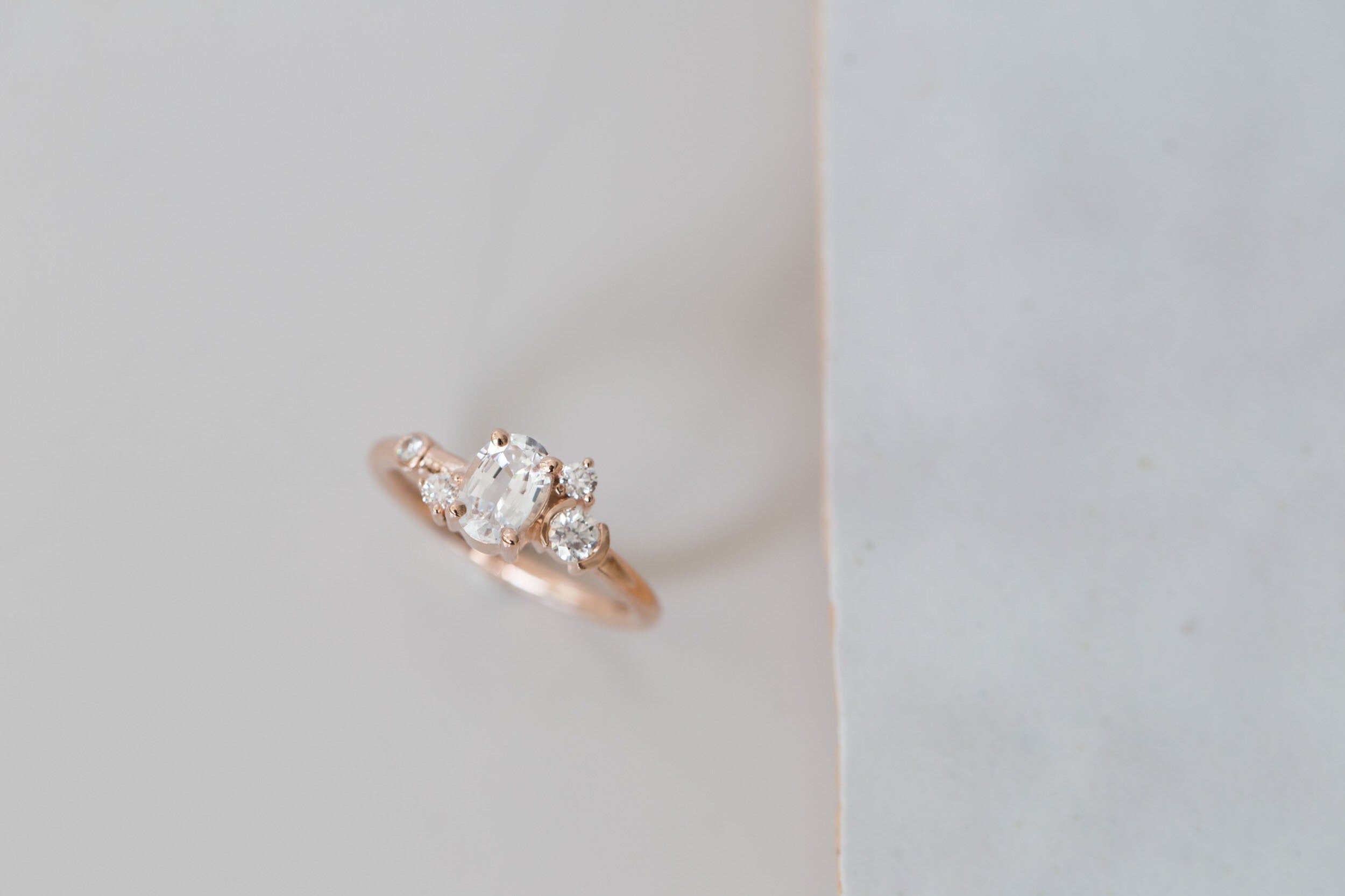 Mae Ring | Oval White Sapphire + Diamond Cluster Engagement Ring | 14k Recycled Rose Gold