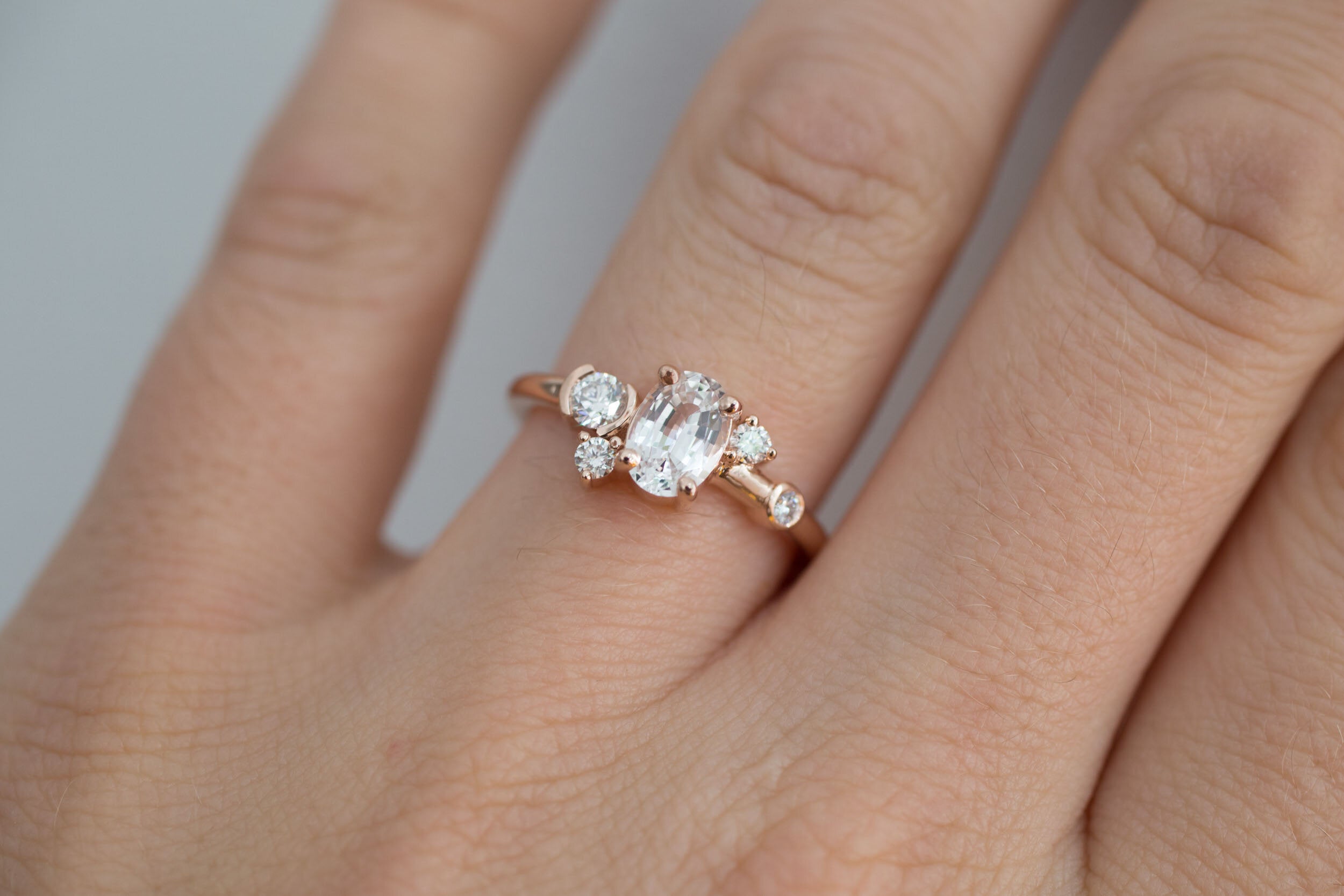 Mae Ring | Oval White Sapphire + Diamond Cluster Engagement Ring | 14k Recycled Rose Gold