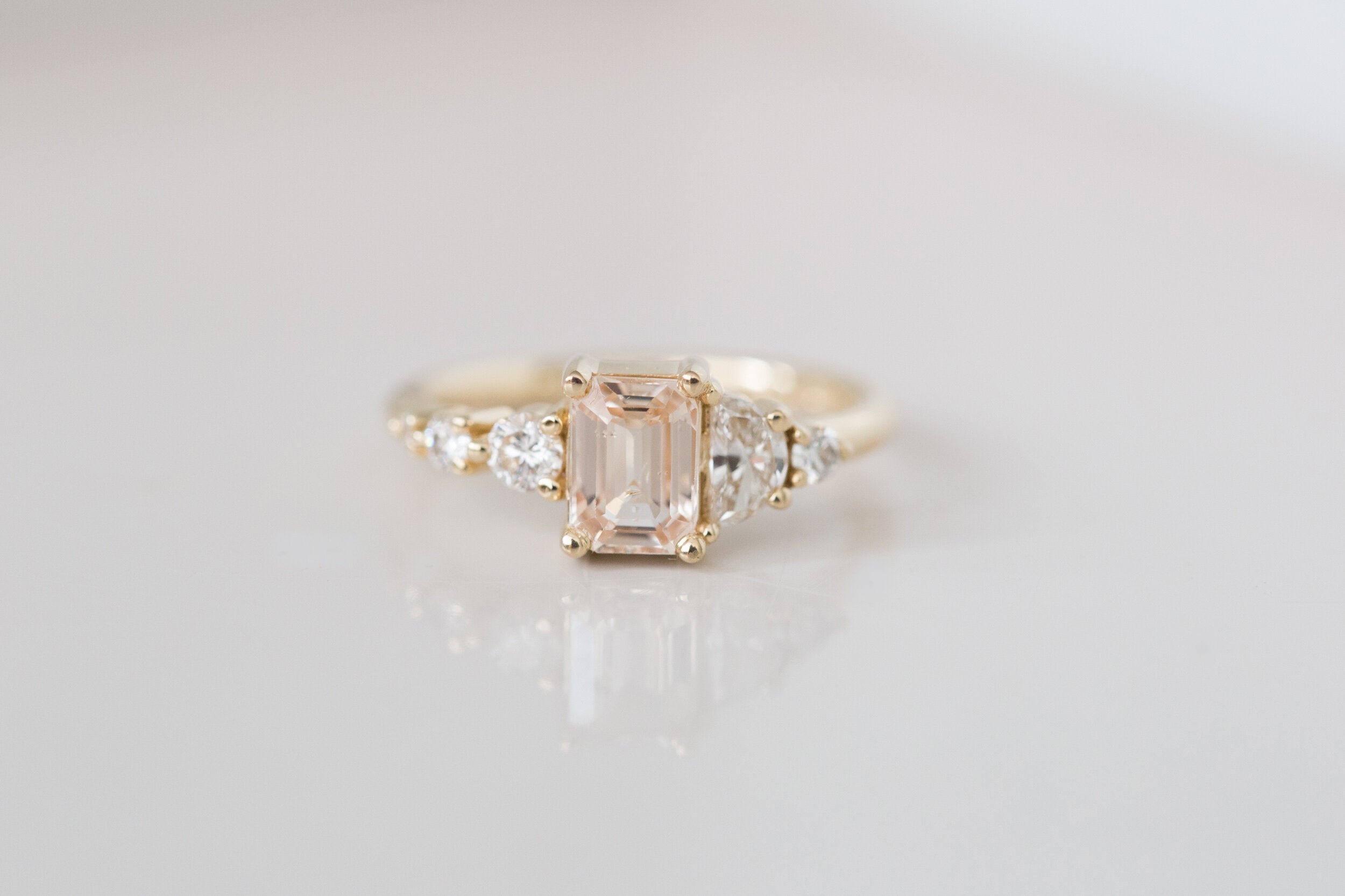 Sarine Ring | Apricot Blush Sapphire + Half Moon Diamond + Diamond Cluster Engagement Ring | 14k Recycled Gold | One of a Kind