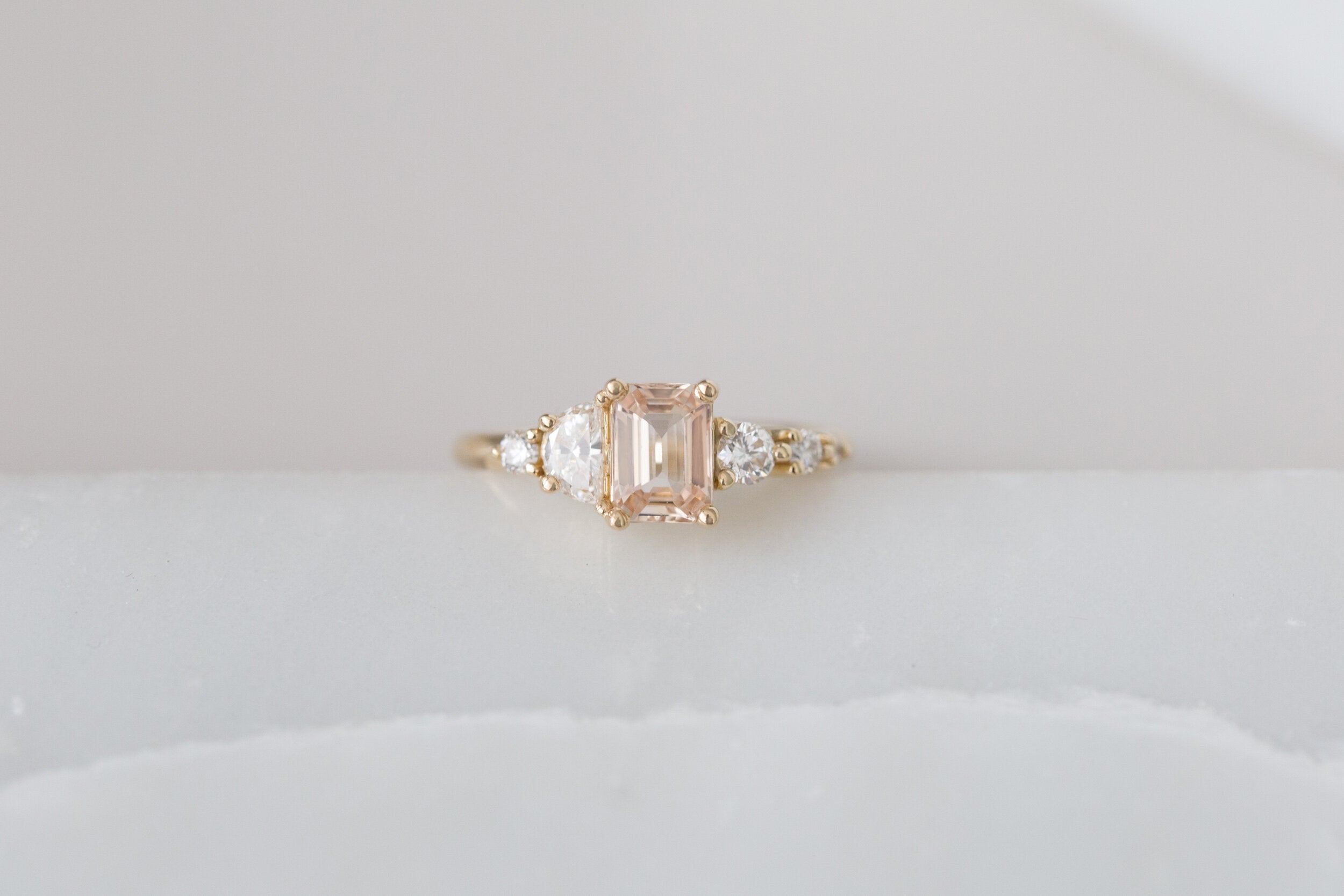 Sarine Ring | Apricot Blush Sapphire + Half Moon Diamond + Diamond Cluster Engagement Ring | 14k Recycled Gold | One of a Kind
