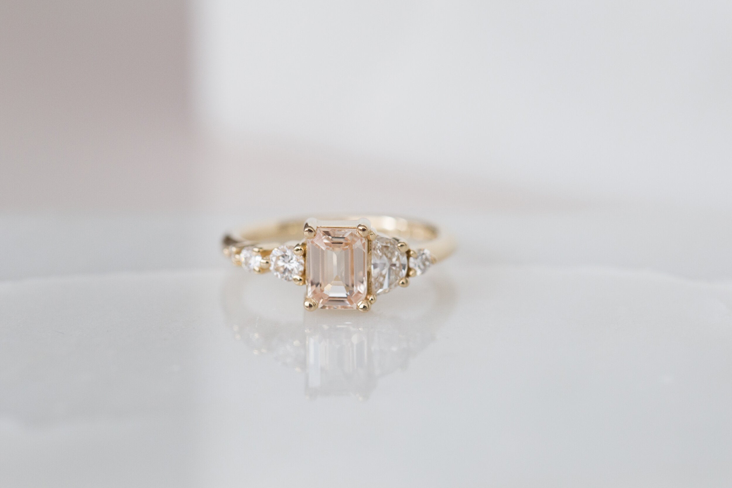 Sarine Ring | Apricot Blush Sapphire + Half Moon Diamond + Diamond Cluster Engagement Ring | 14k Recycled Gold | One of a Kind