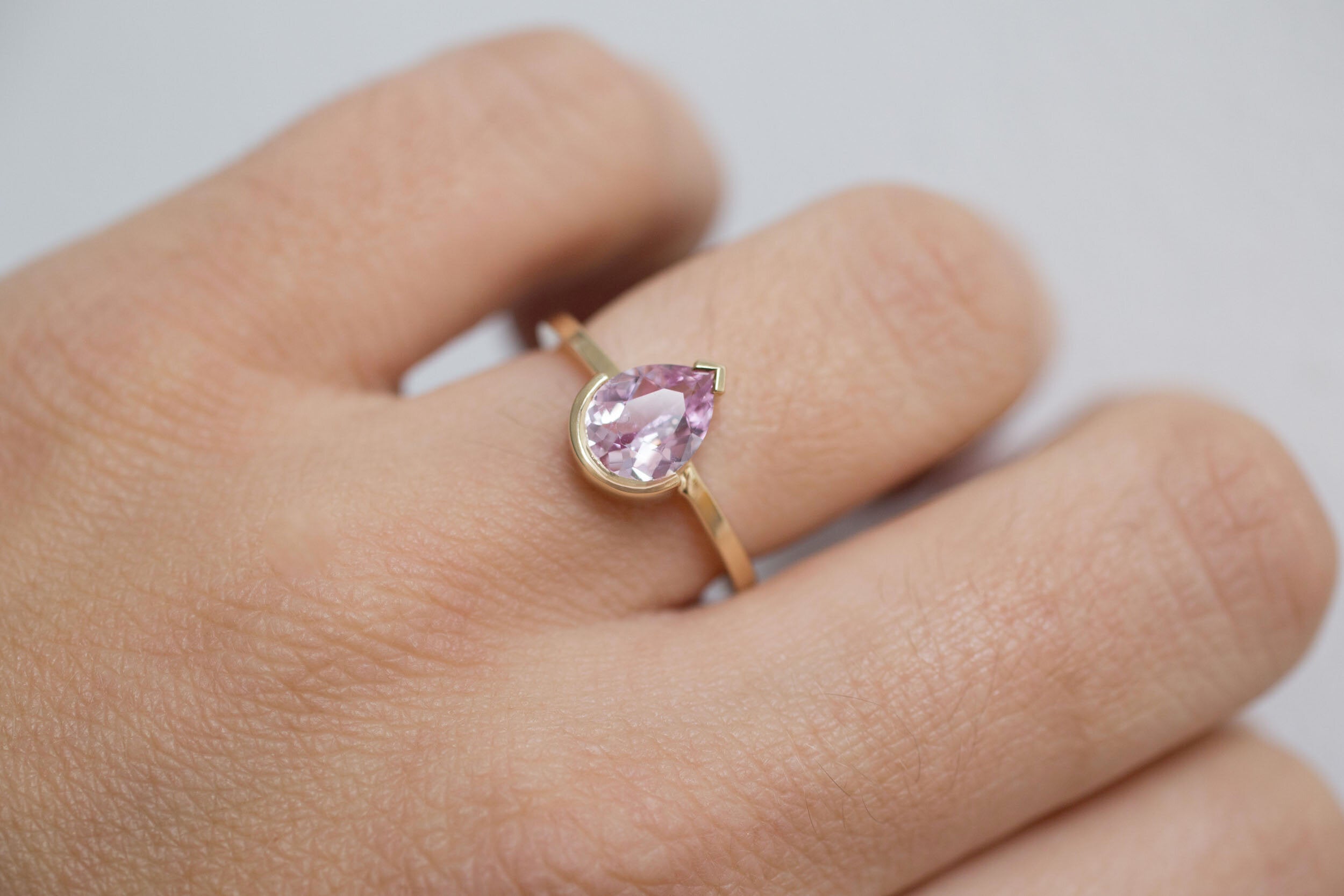 Varda Ring | Pink Pear Sapphire + Half Bezel Solitaire Engagement Ring 1.21 ct | 14k Recycled Gold | One of a Kind
