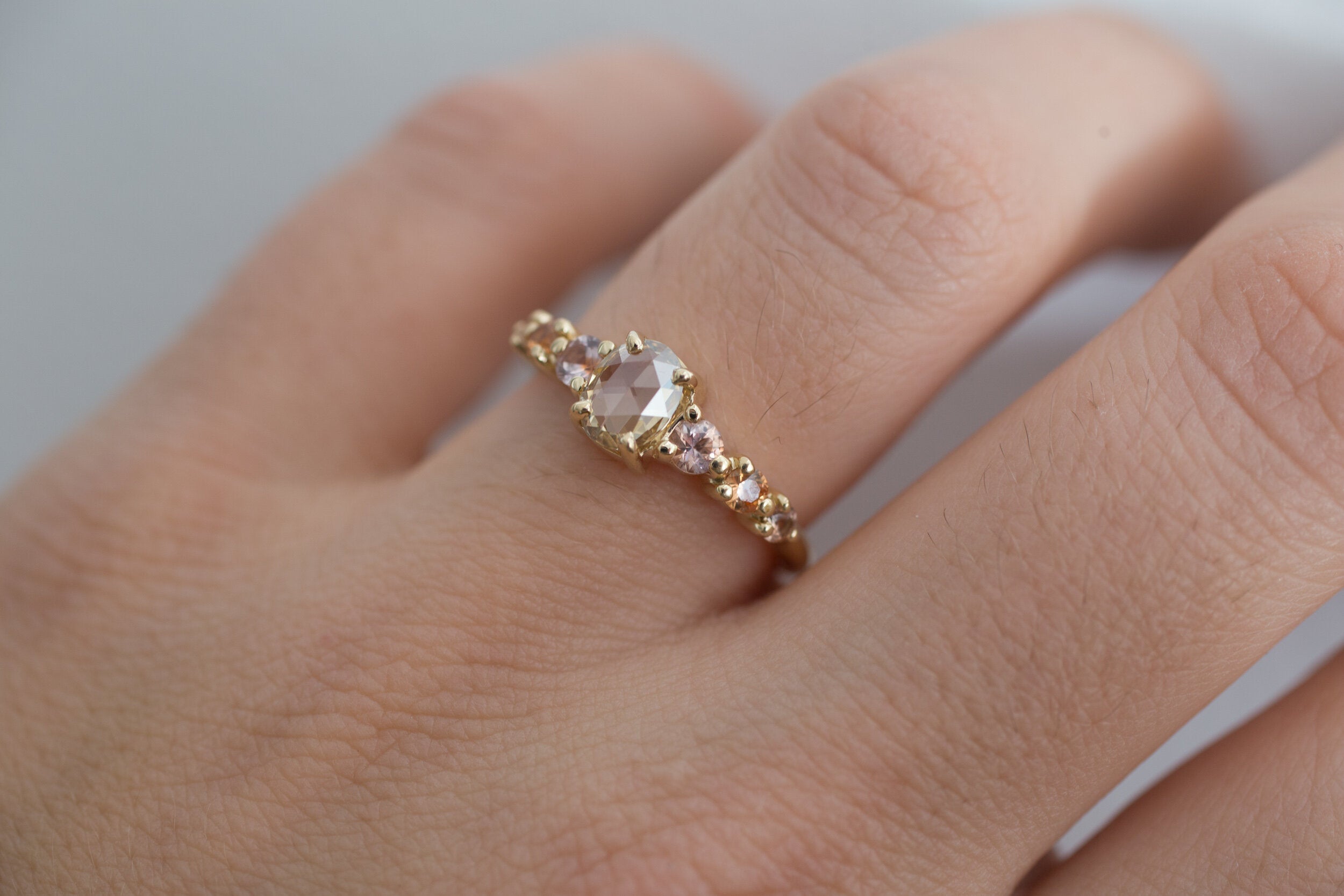 Senna Ring | Rose Cut Oval Champagne Diamond + Peach Sapphire Accent Engagement Ring | One of a Kind