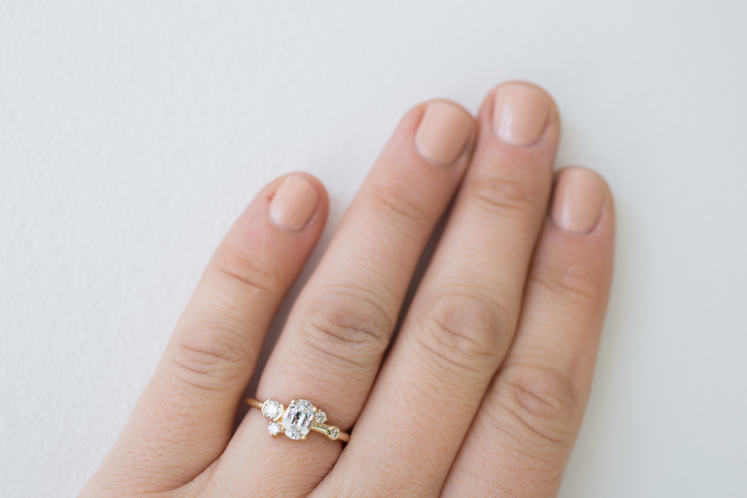 Mae Ring | Oval White Sapphire + Diamond Cluster Ring | 14k Recycled Gold