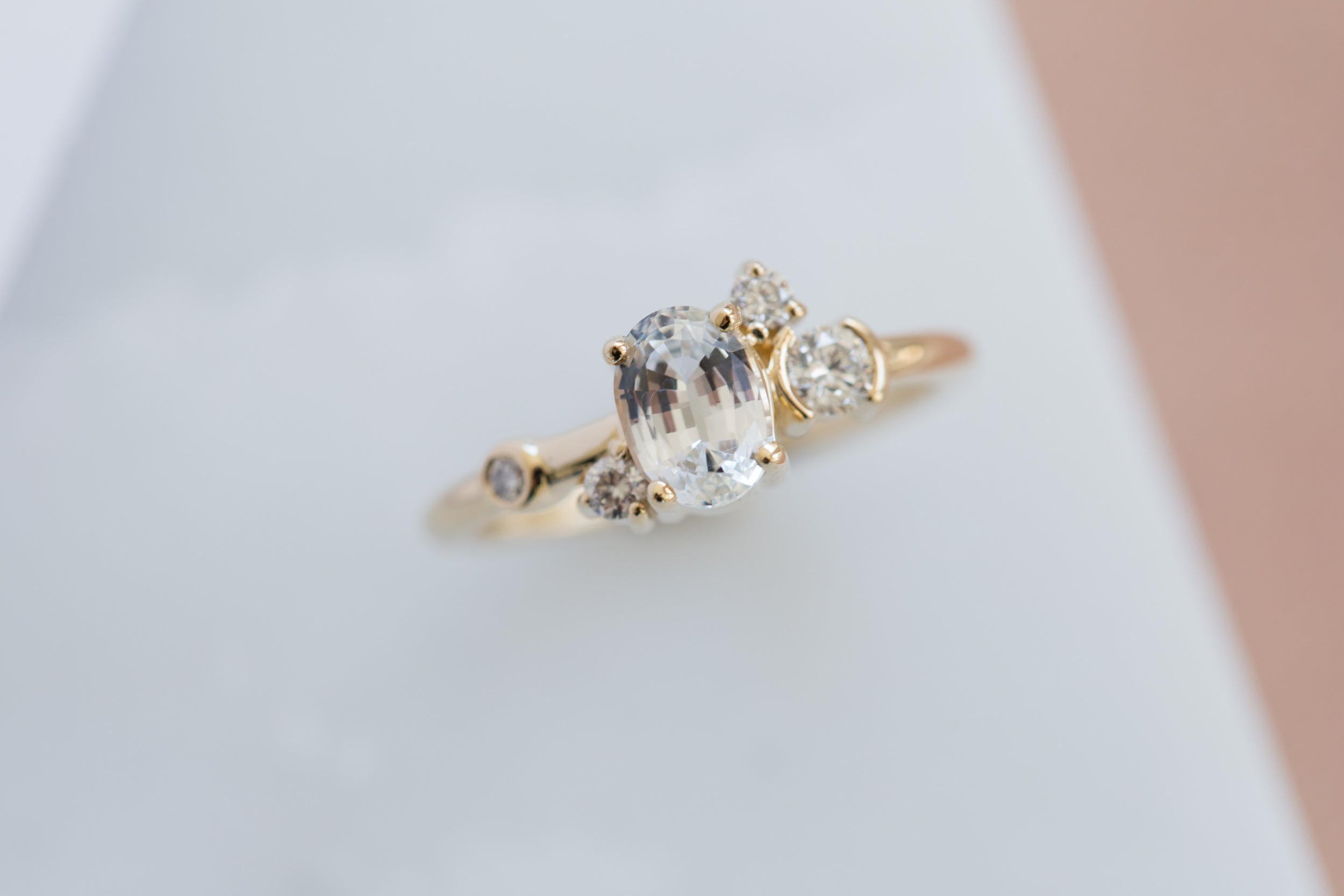 Mae Ring | Oval White Sapphire + Diamond Cluster Ring | 14k Recycled Gold