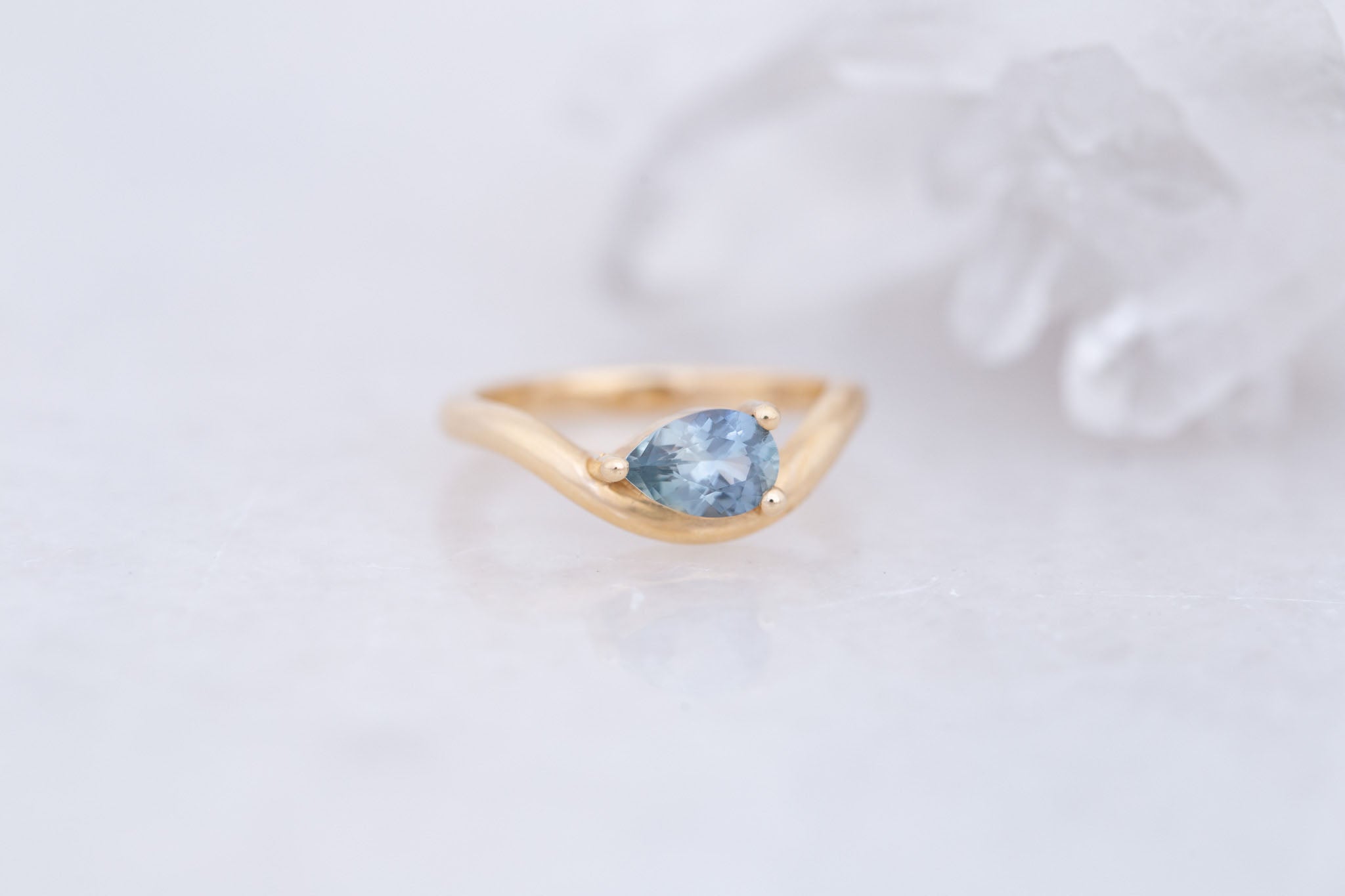 Rhodes Ring | Blue Montana Pear Cut Sapphire Solitaire + Curved Band Engagement Ring 0.88 ct | 14k Recycled Gold | One of a Kind