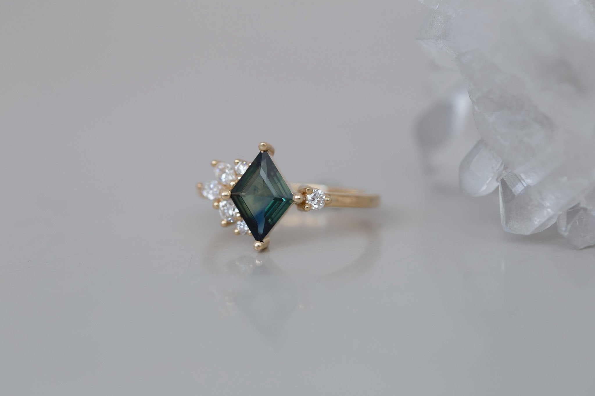 Alden Ring | Teal Sapphire Rhombus + Diamond Cluster Engagement Ring 1