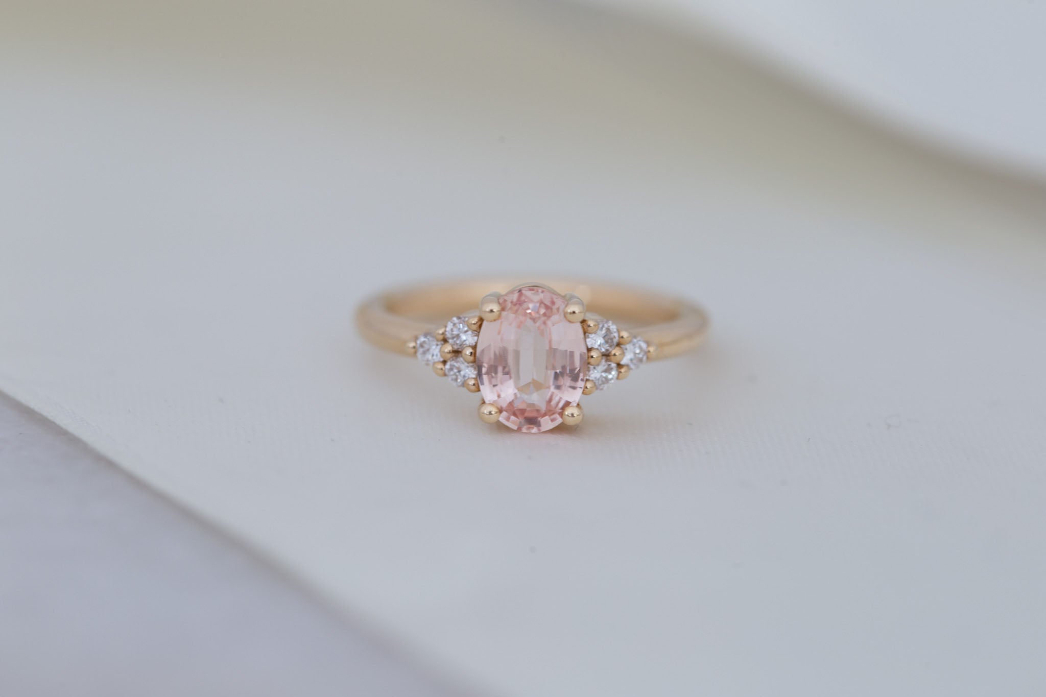 Verona Ring | Peach Oval Sapphire + Round Diamond Accents Engagement Ring 1.68 ct | 14k Recycled Gold | One of a Kind