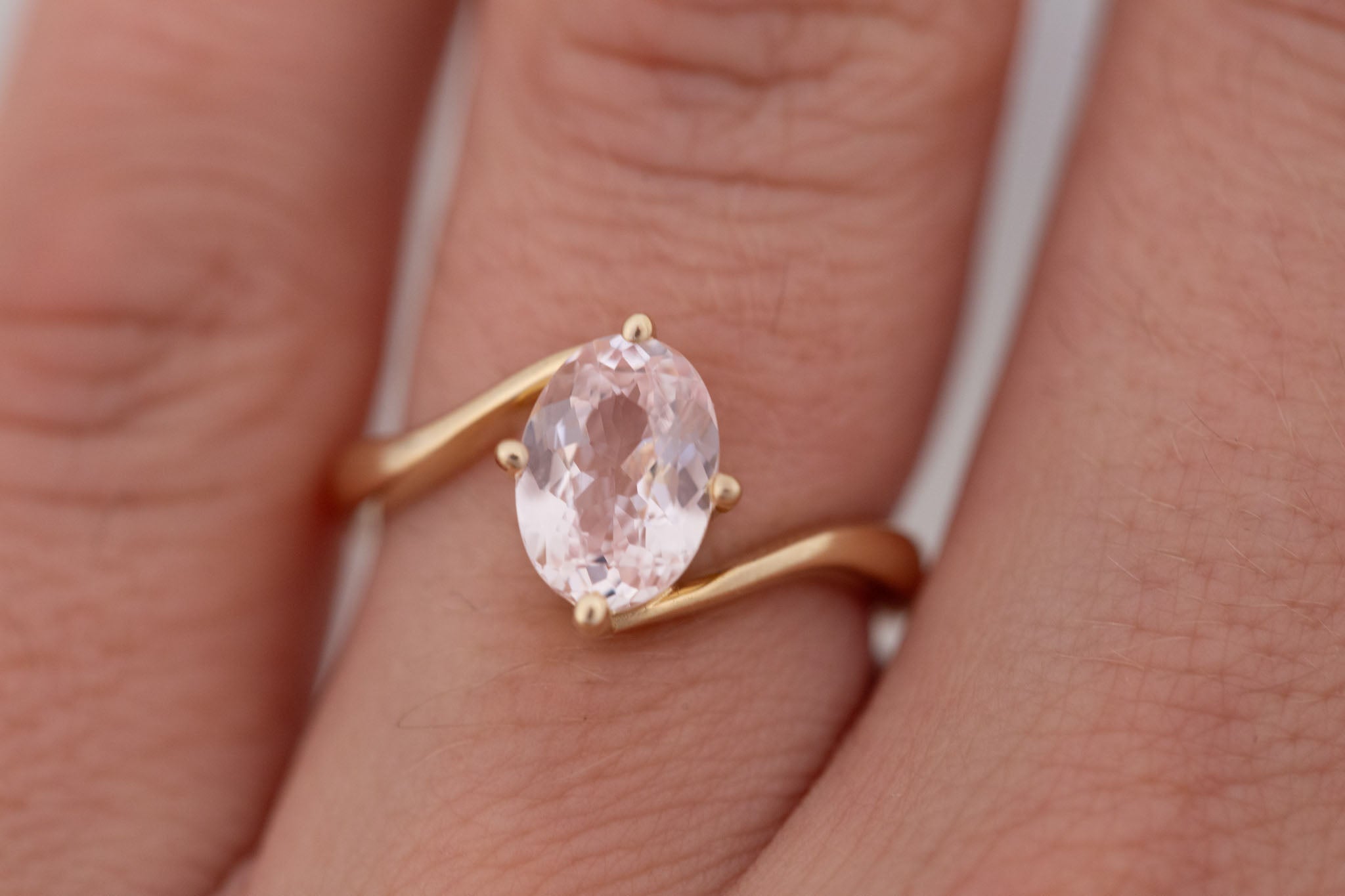 Marin Ring | Blush Oval Sapphire Bypass Engagement Ring 2.07 ct | 14k Recycled Gold | One of a Kind