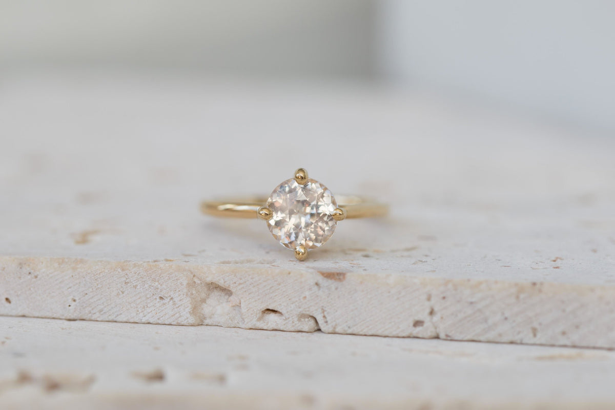 Leta Ring | Icy Blush Round Sapphire Compass Set Solitaire Engagement
