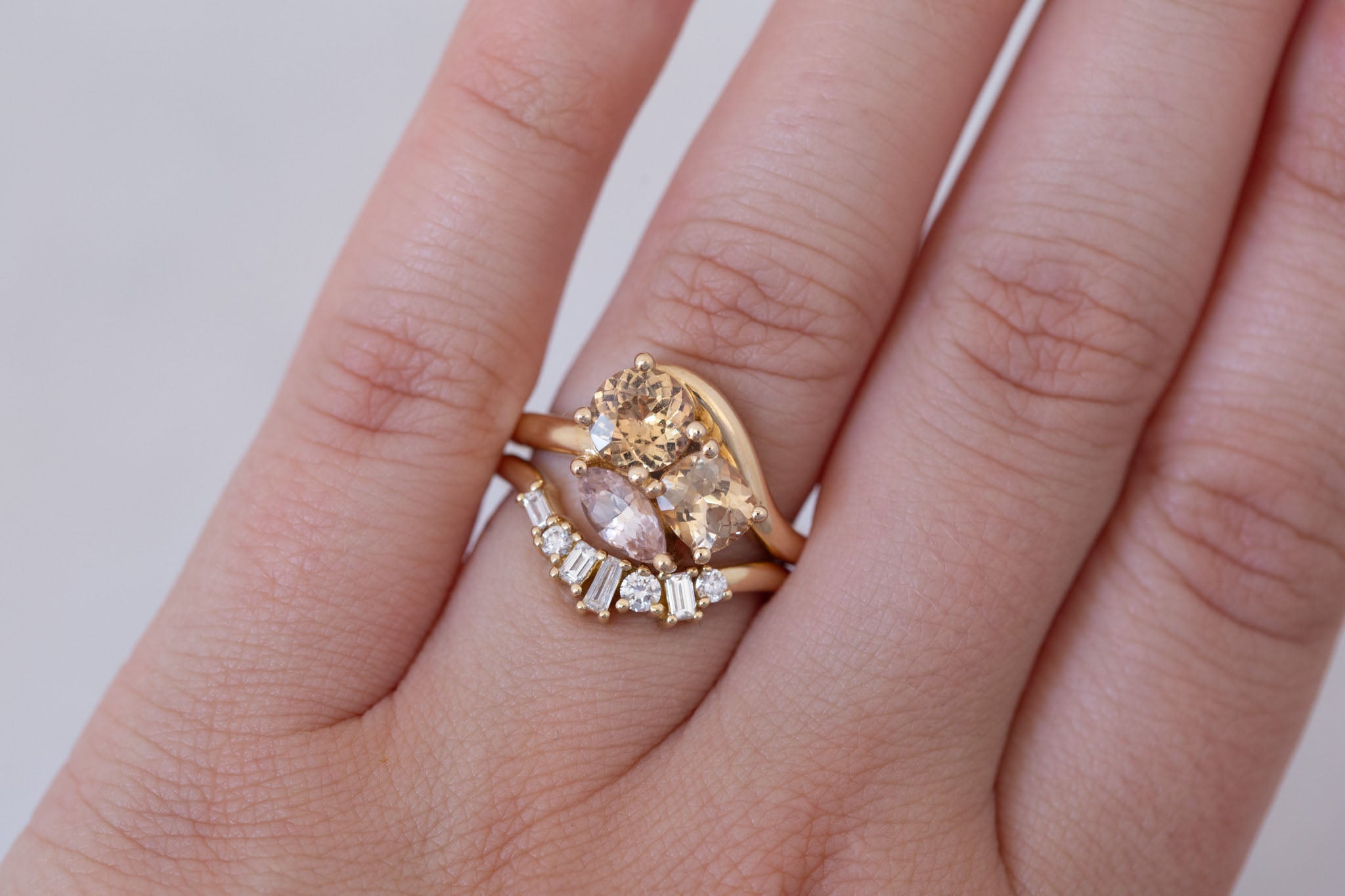 Valeria Ring | Apricot + Blush Sapphire Curved Band Engagement Ring | 14k Recycled Gold | One of a Kind