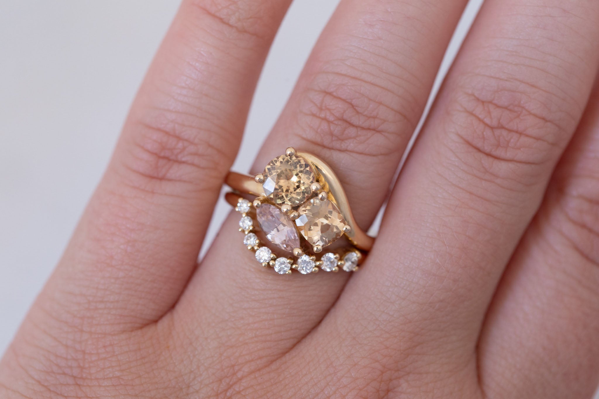 Valeria Ring | Apricot + Blush Sapphire Curved Band Engagement Ring | 14k Recycled Gold | One of a Kind